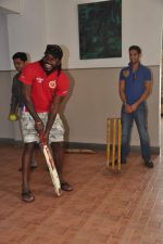 Chris Gayle and Siddharth Mallya spend time with NGO kids in Worli, Mumbai on 26th April 2013 (39).JPG